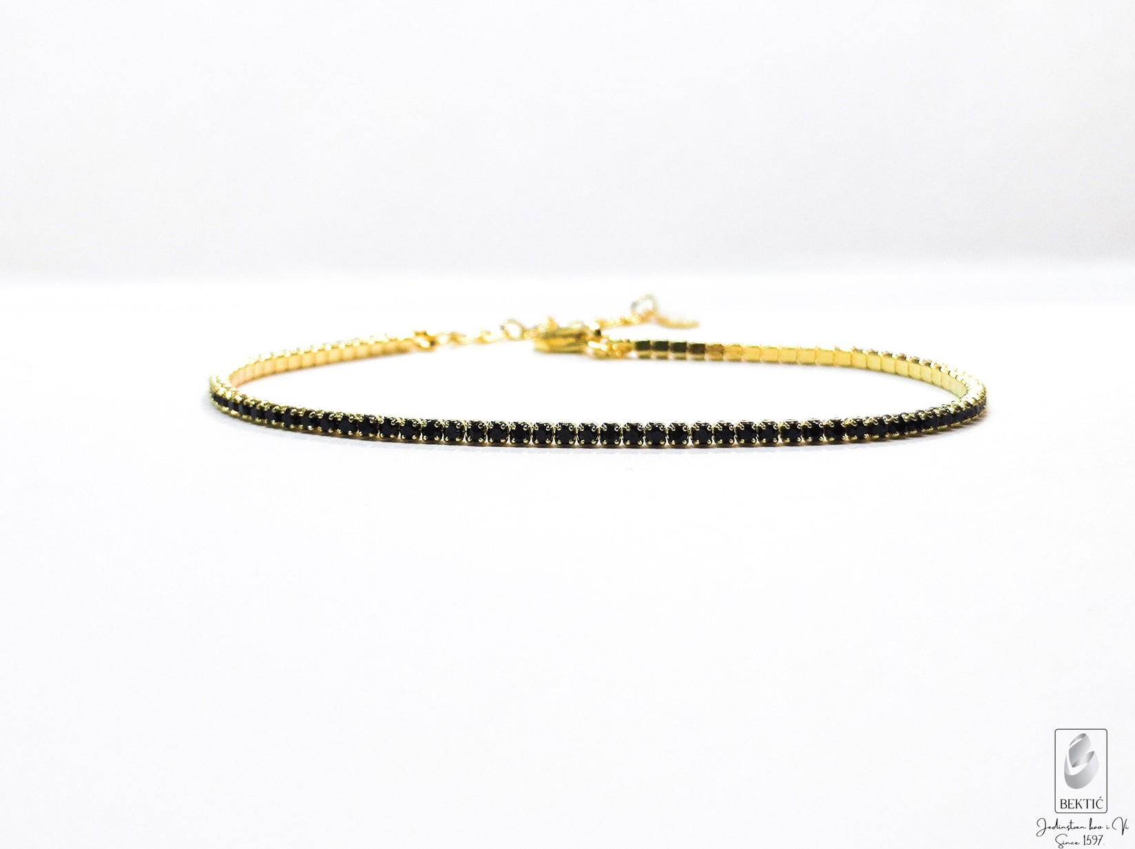 Narukvica sa pozlatom i cirkonima